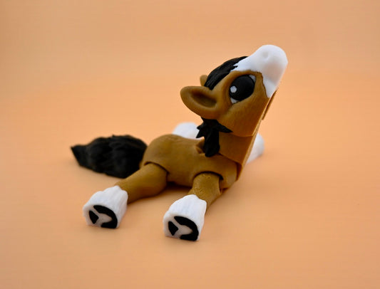 Mini tan foal