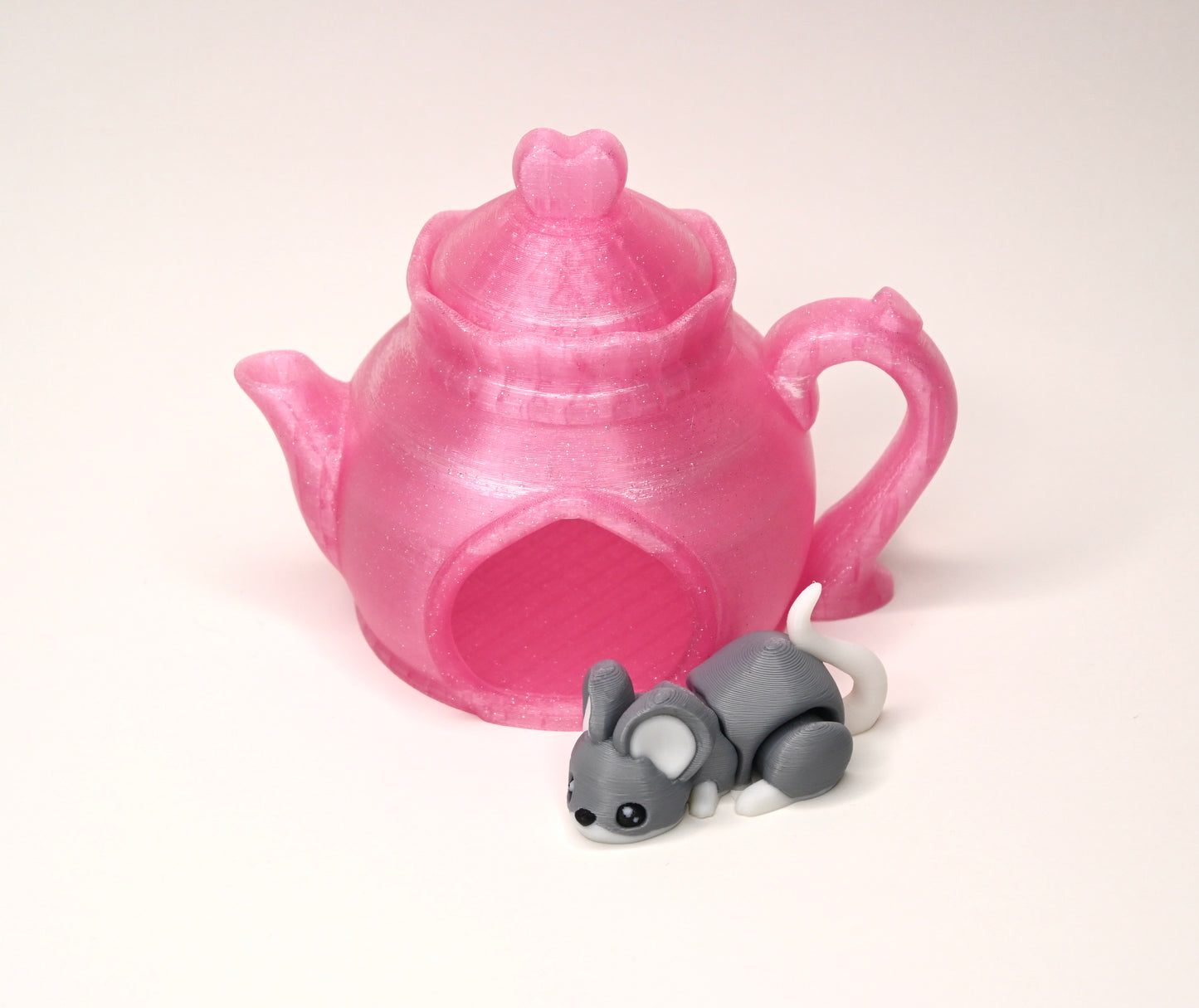 Teapot house with mouse