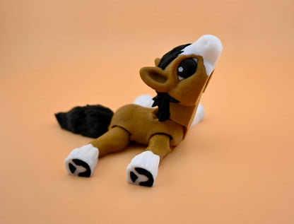 Mini tan foal